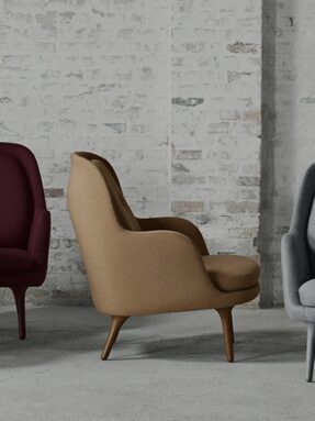 Tan leather armchair in a bright interior.