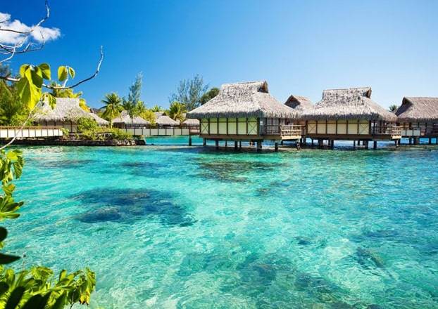 Luxury overwater resort with clear lagoon