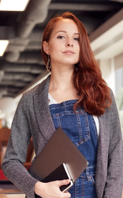 Woman wearing blue sweater, professional portrait