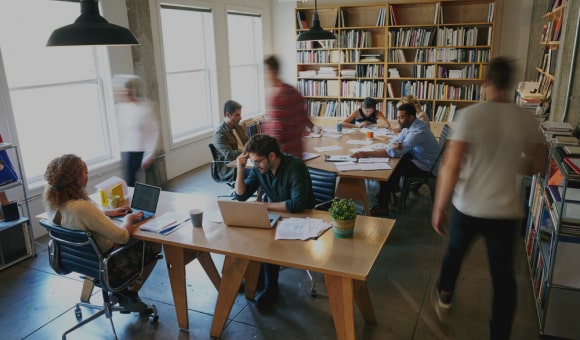 People collaborating in modern workspace